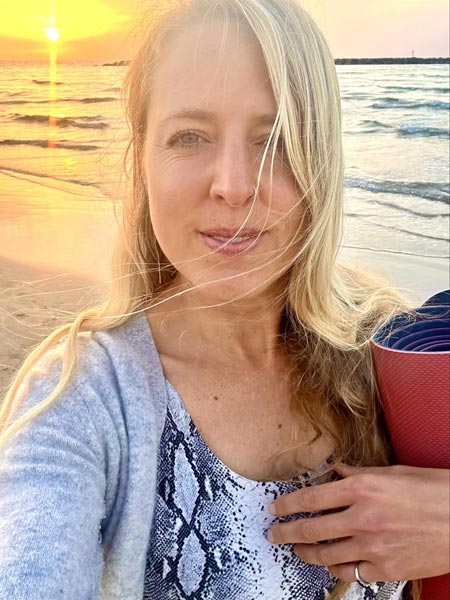 A post-yoga sunset stroll down the Tel Aviv beach.
