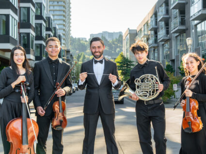 Conductor and musicians on a street