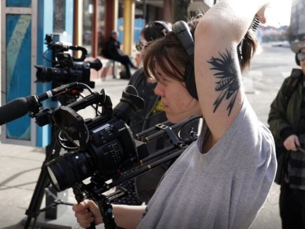 person holding a video camera